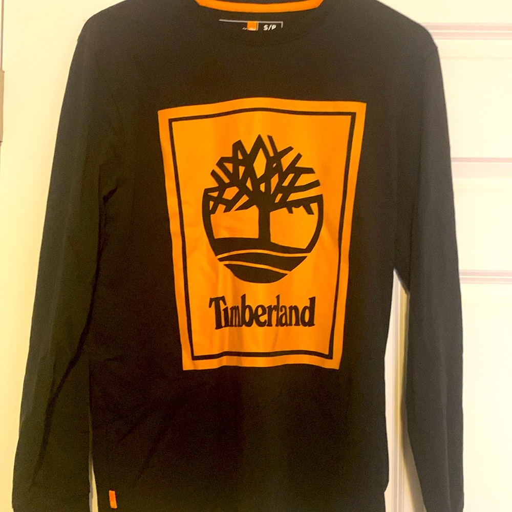 Brand Timberland. Color black , brown logo. Size S